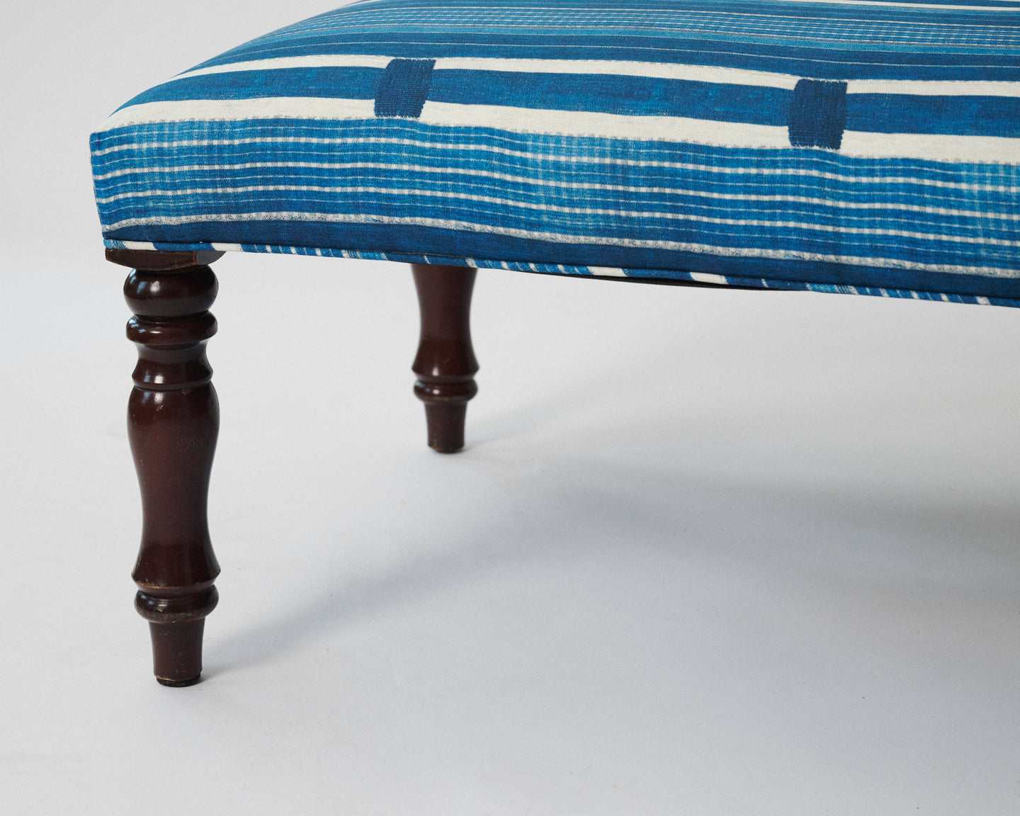 Vintage Upholstered Ottoman with Turned Legs